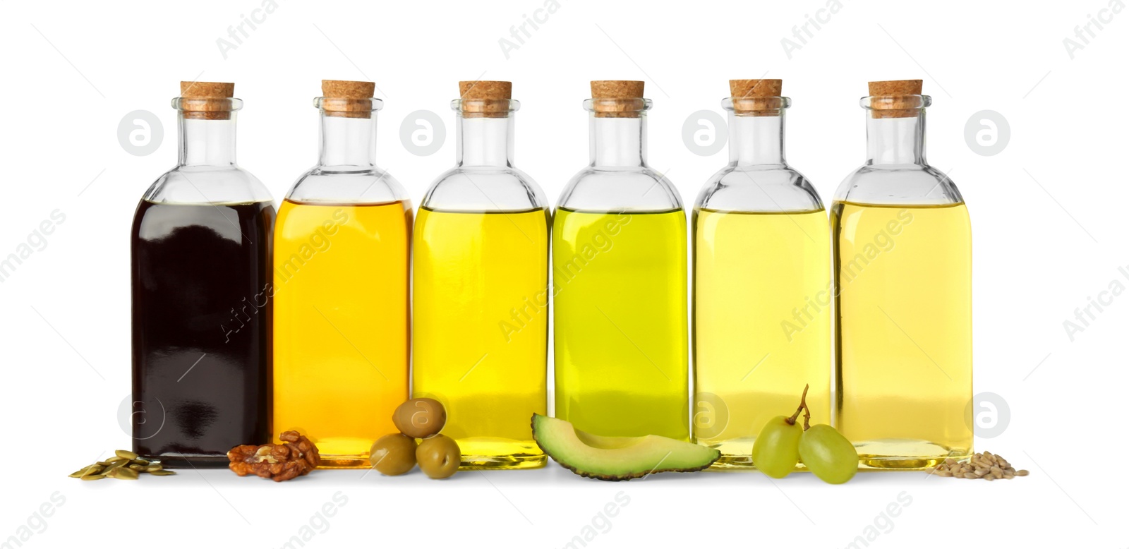 Photo of Vegetable fats. Bottles of different cooking oils and ingredients isolated on white