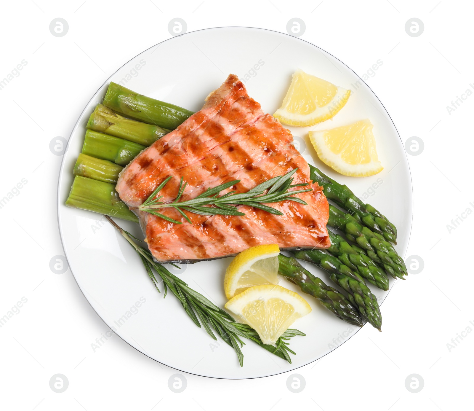 Photo of Tasty grilled salmon with asparagus, lemon and rosemary on white background, top view