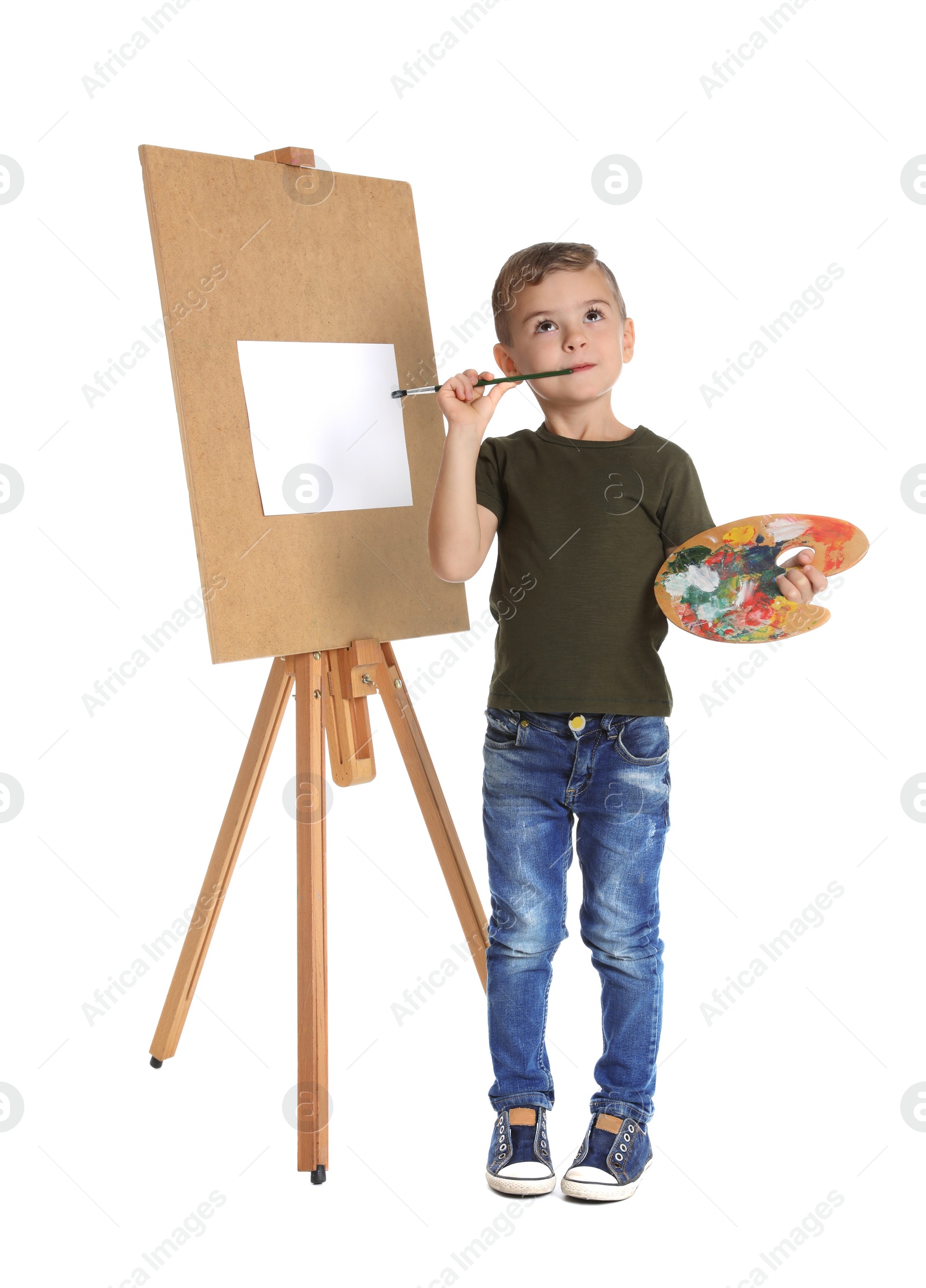 Photo of Child painting picture on easel against white background. Space for text