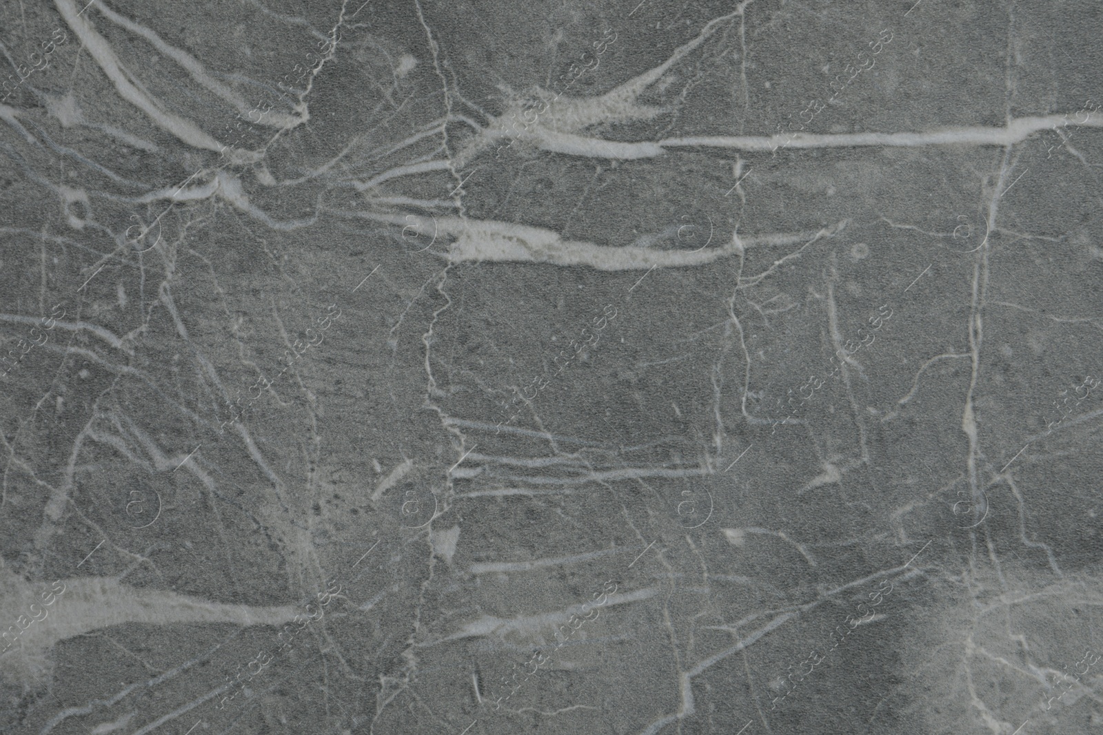 Photo of Texture of grey marble surface as background, closeup