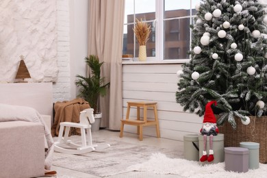 Room interior with Christmas tree and festive decor