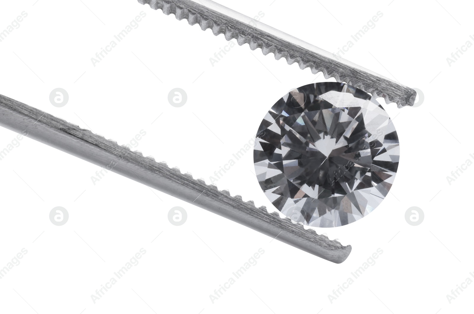 Photo of Tweezers with beautiful shiny diamond isolated on white