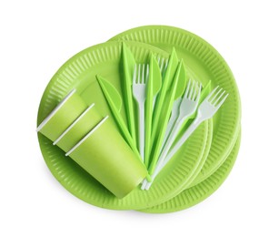 Photo of Set of bright disposable tableware on white background, top view