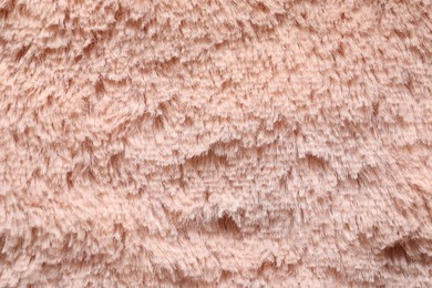 Photo of Texture of pink faux fur as background, closeup