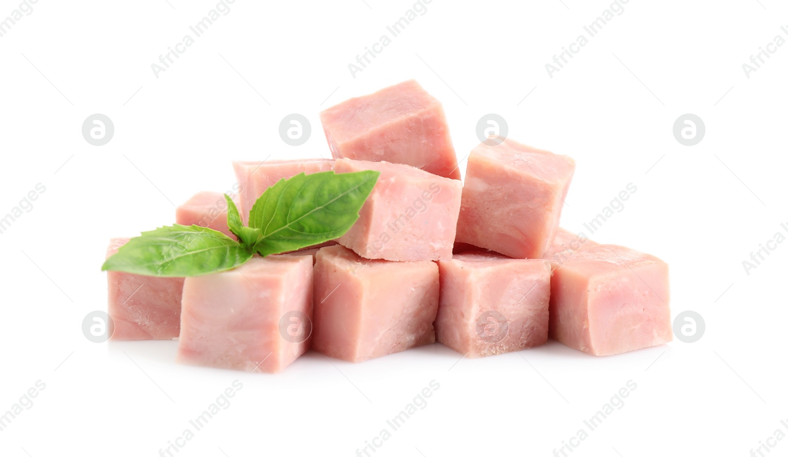 Photo of Cubes of tasty fresh ham with basil isolated on white