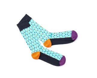 Photo of Colorful socks on white background, top view