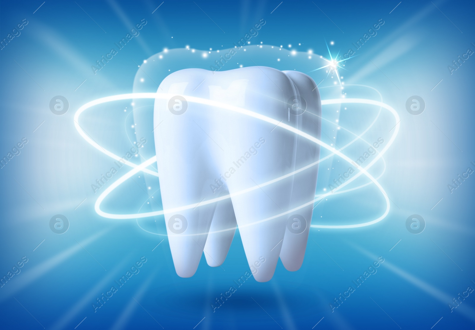 Image of Tooth model with glowing on blue background. Dental care