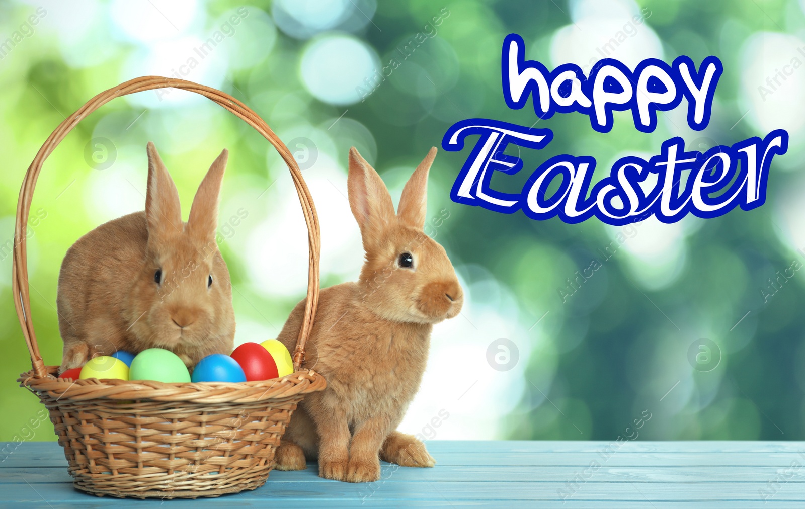 Image of Happy Easter. Adorable bunnies and wicker basket with eggs on wooden table outdoors