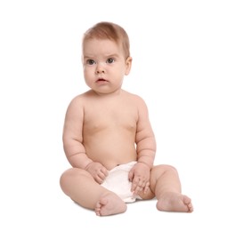 Photo of Cute little baby in diaper sitting on white background