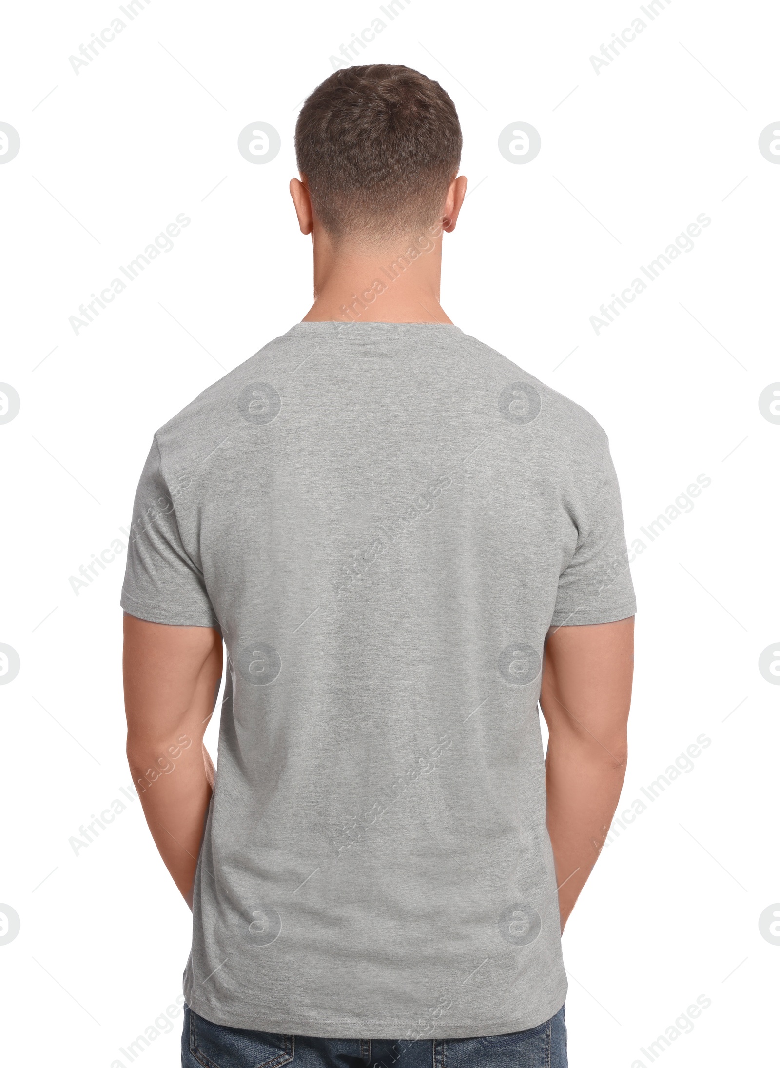 Photo of Man wearing grey t-shirt on white background, back view. Mockup for design