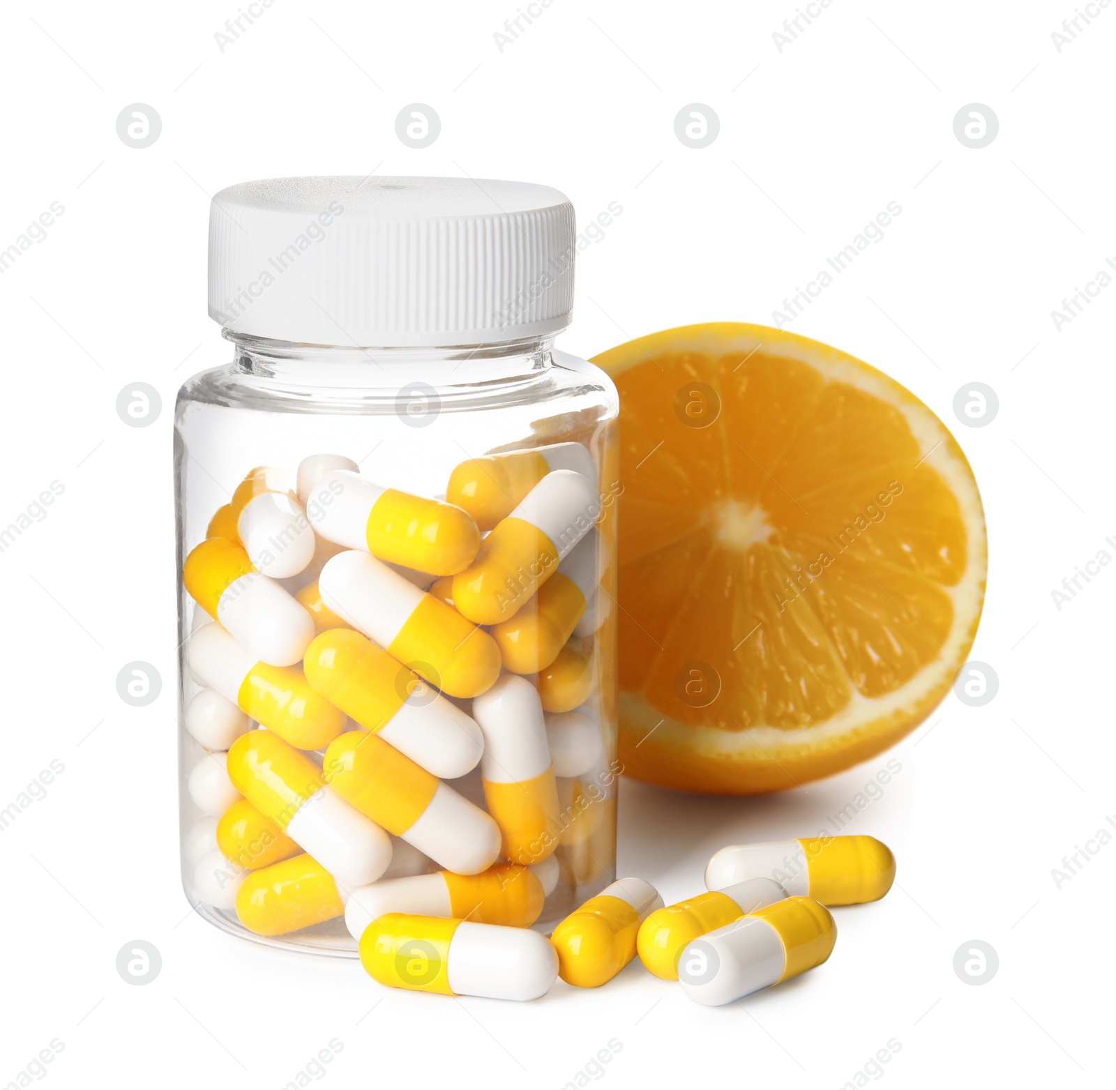 Photo of Bottle with vitamin pills and lemon on white background