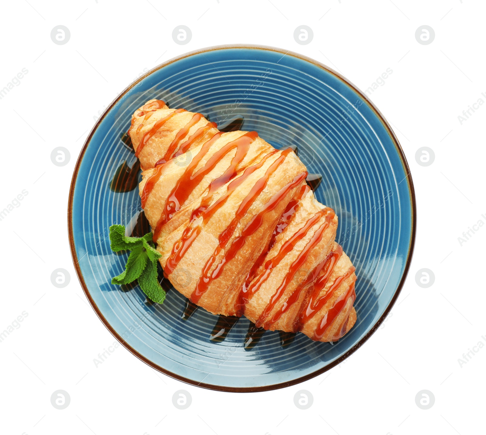 Photo of Plate with tasty croissant on white background, top view