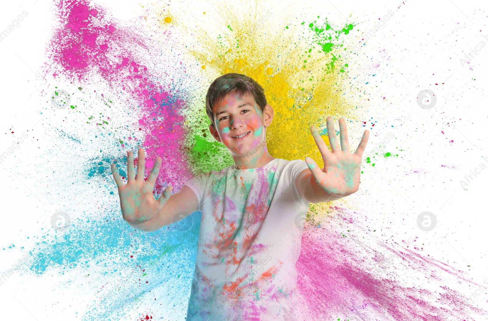 Image of Holi festival celebration. Happy teen boy covered with colorful powder dyes on white background