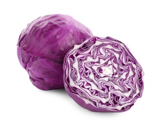 Whole and cut red cabbages on white background