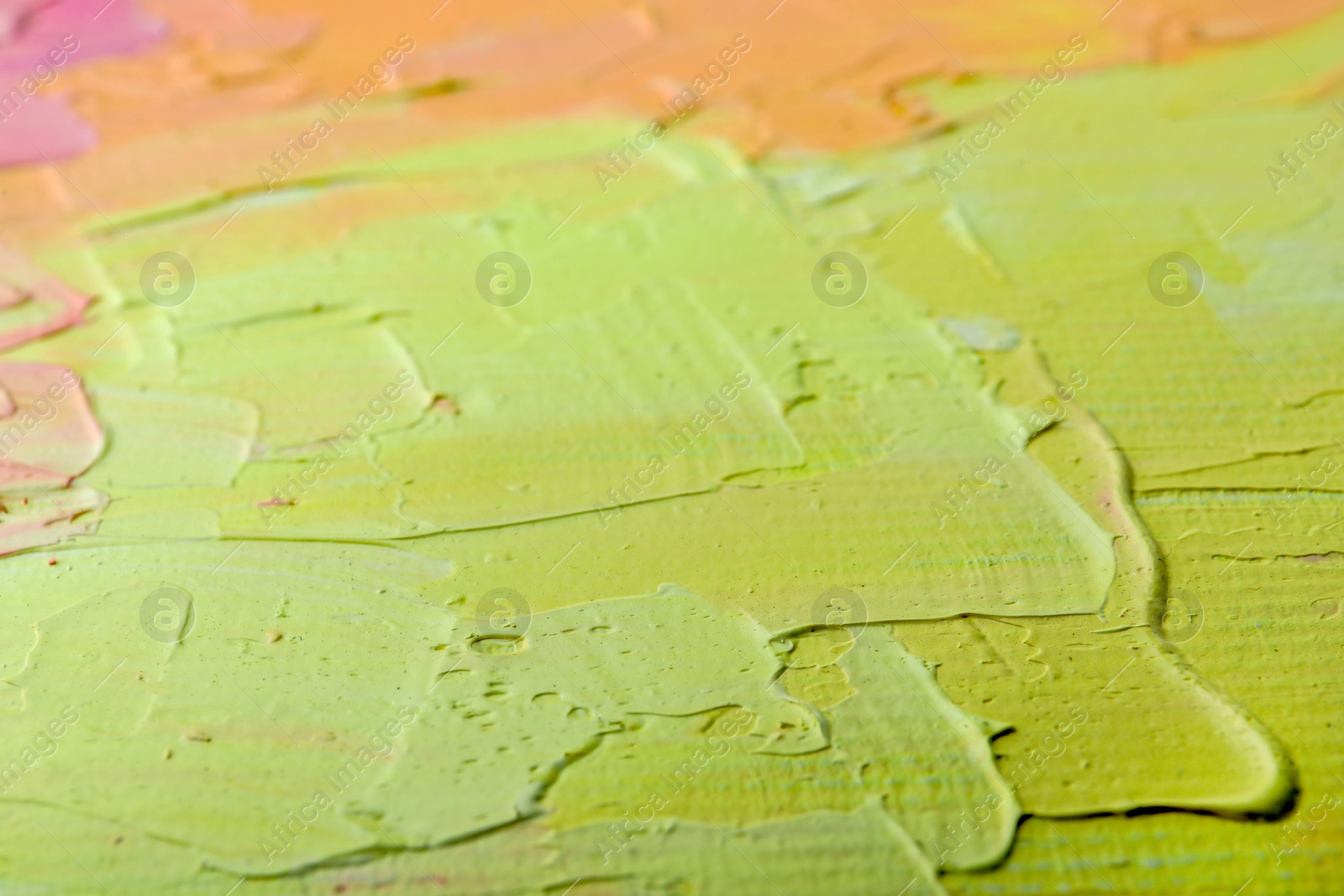 Photo of Beautiful strokes of pastel oil paints as background, closeup