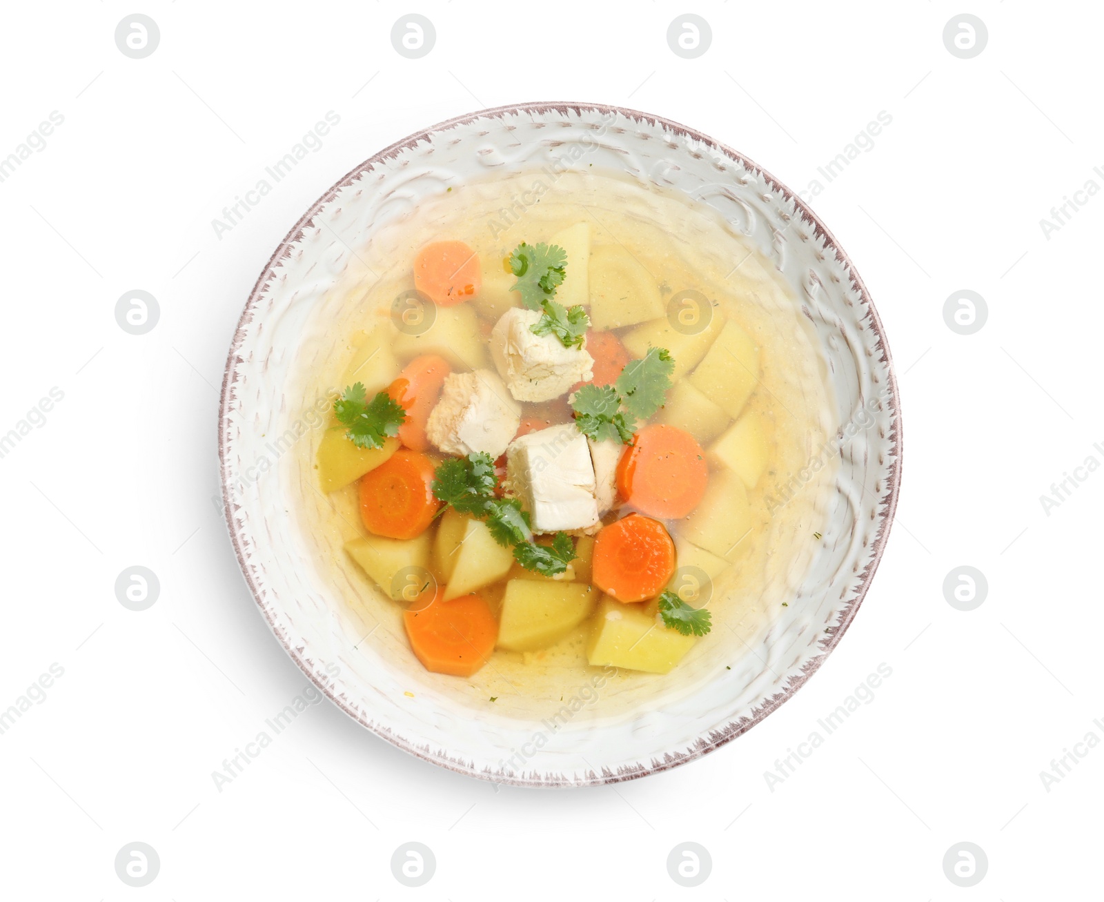 Photo of Dish with fresh homemade chicken soup on white background, top view