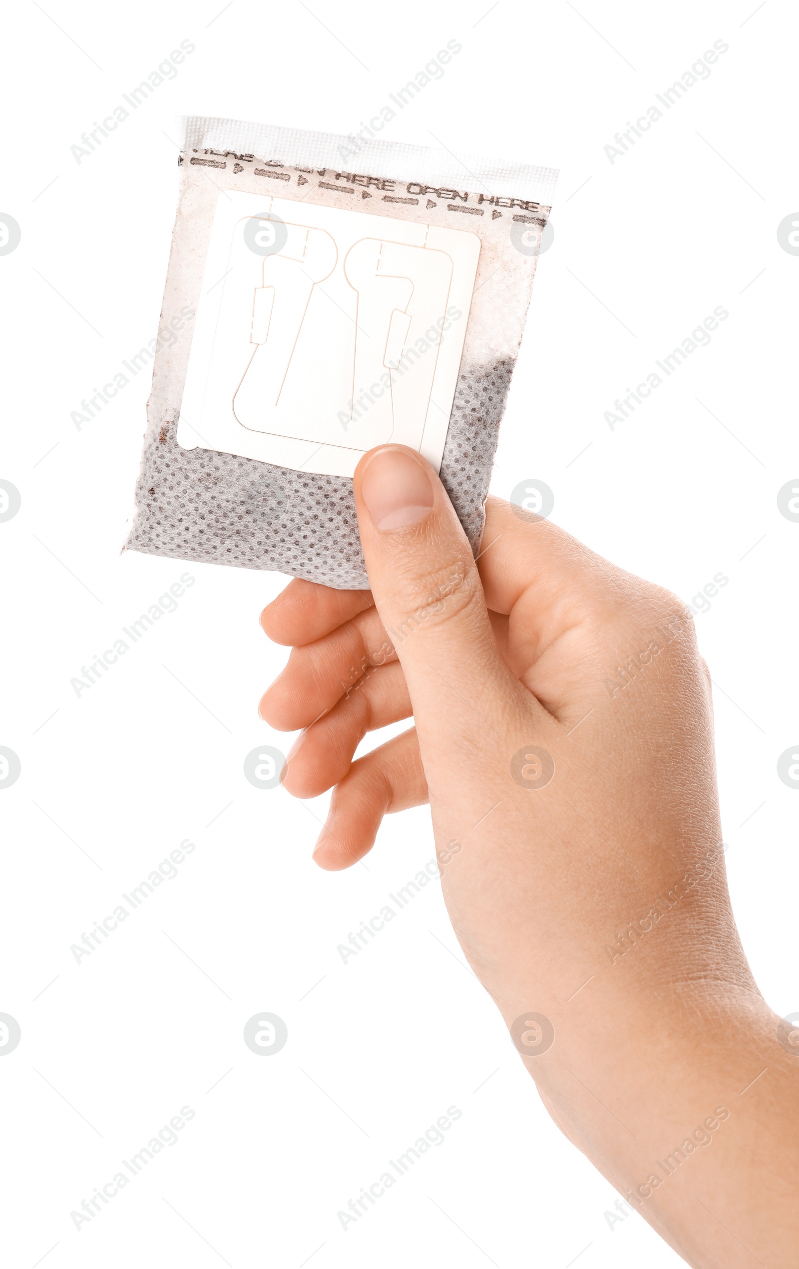 Photo of Woman holding drip coffee bag on white background, closeup