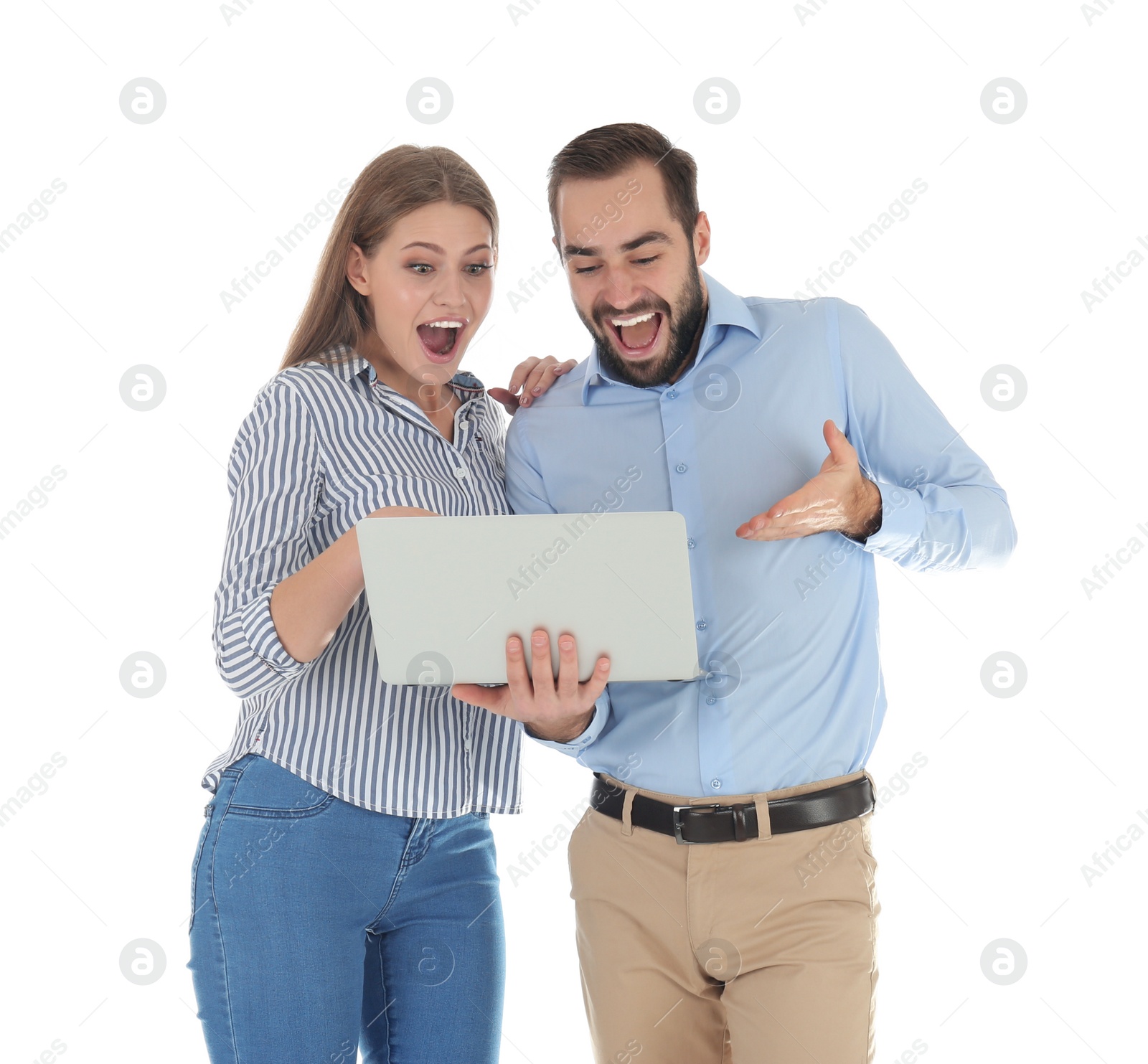 Photo of Emotional young people with laptop celebrating victory on white background