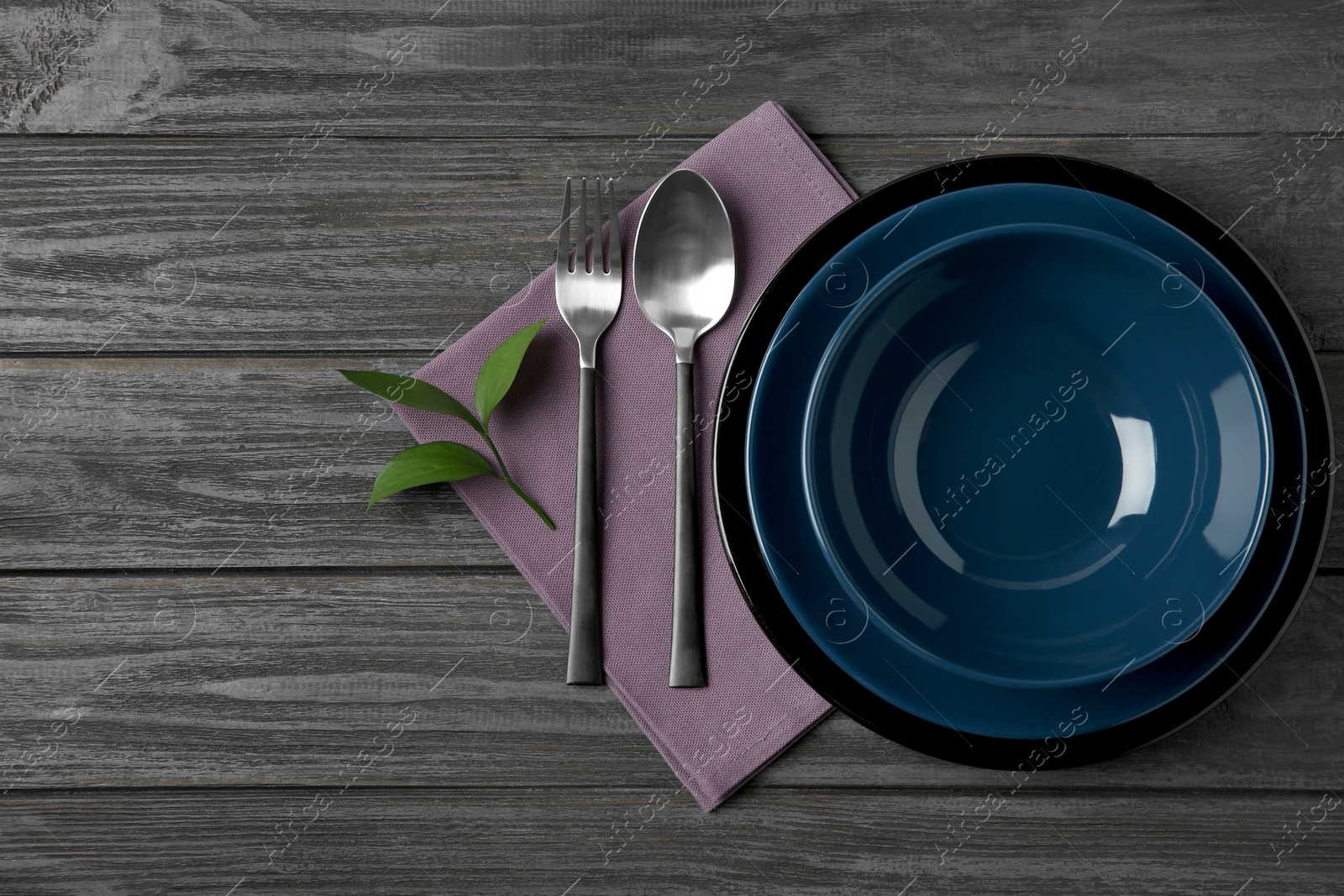 Photo of Beautiful table setting on dark wooden background, flat lay