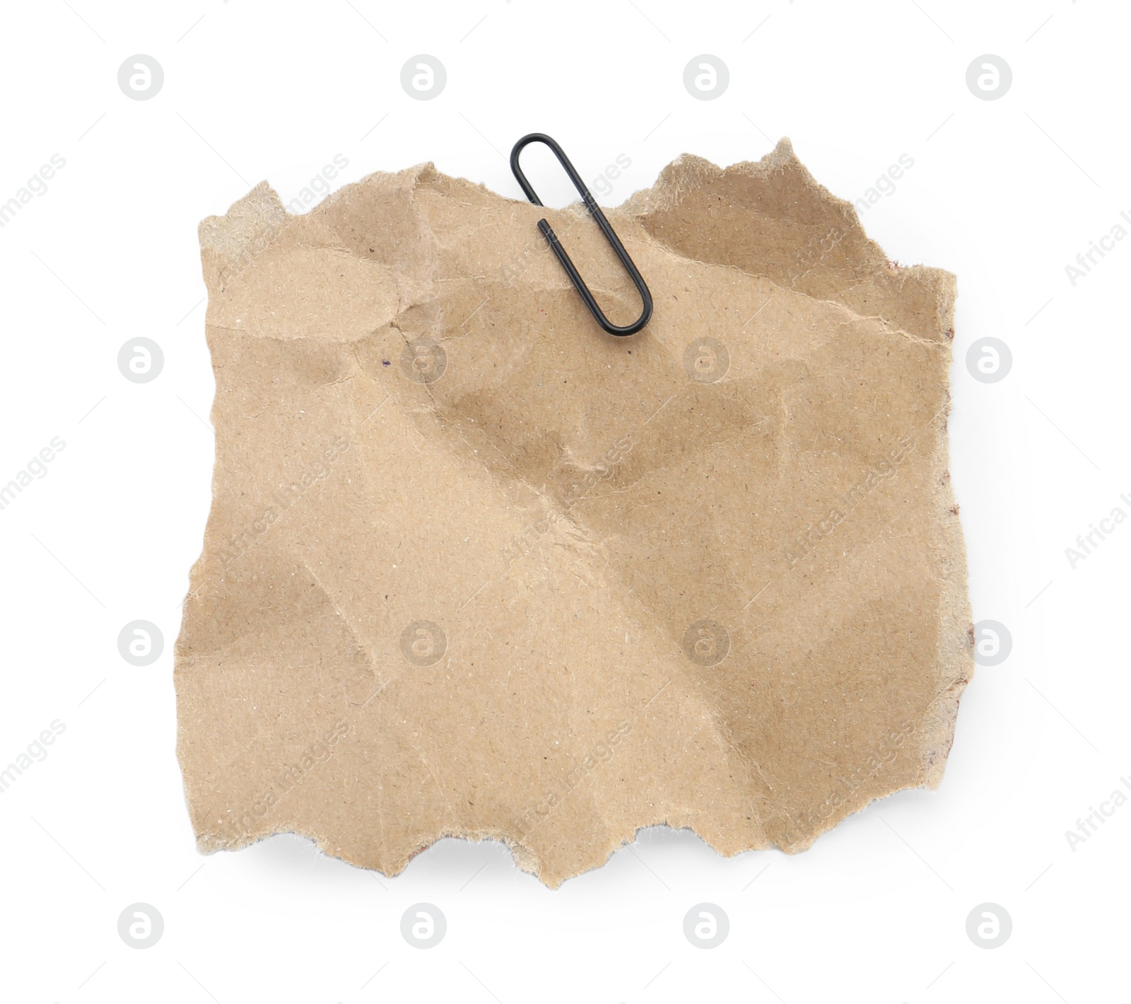 Photo of Piece of kraft notebook paper with clip isolated on white, top view