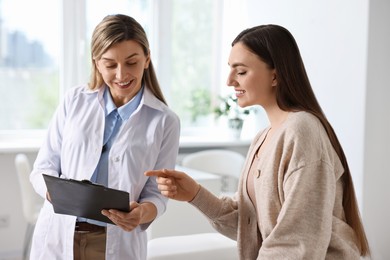 Professional doctor working with patient in hospital