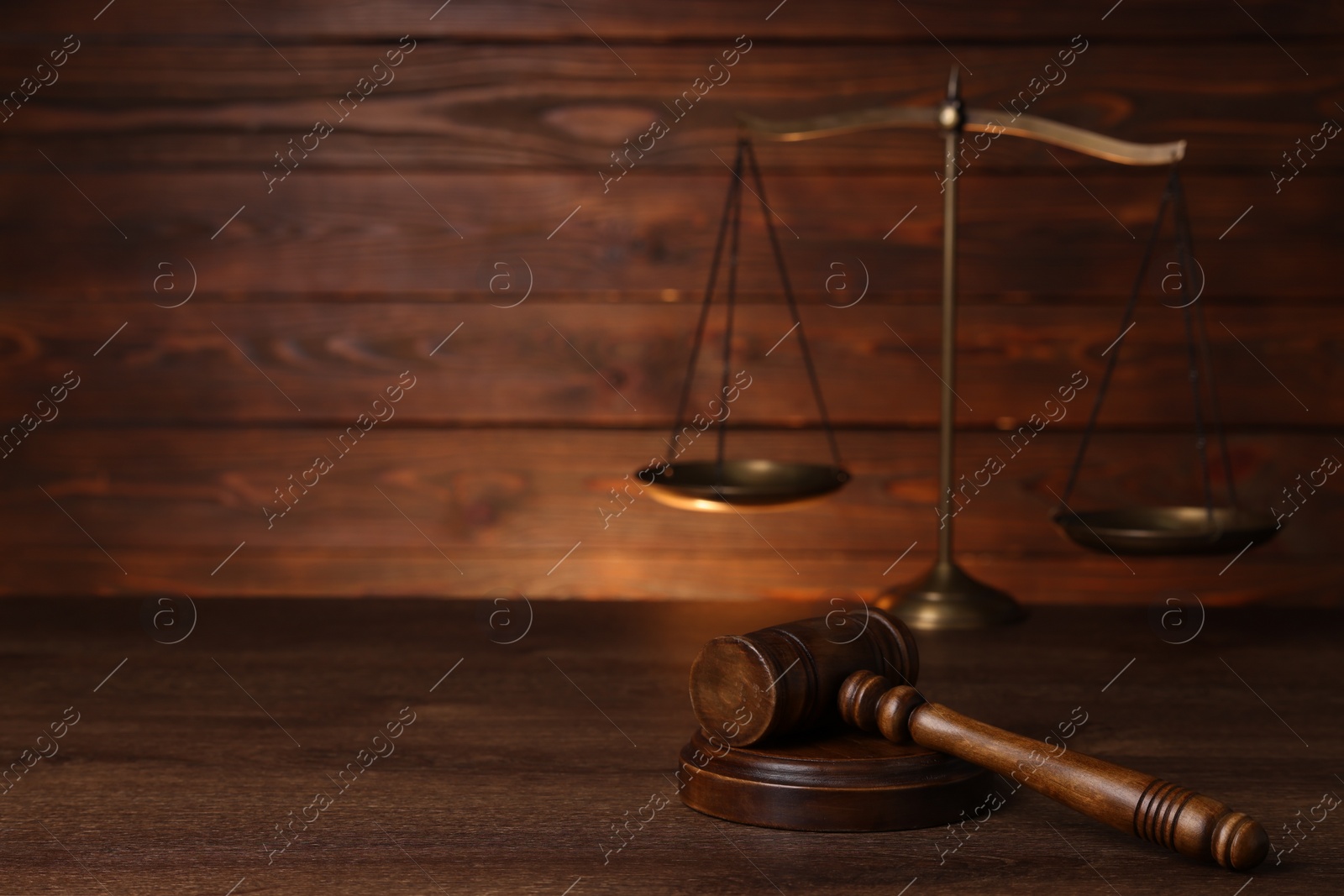 Photo of Law concept. Judge's gavel on wooden table, space for text