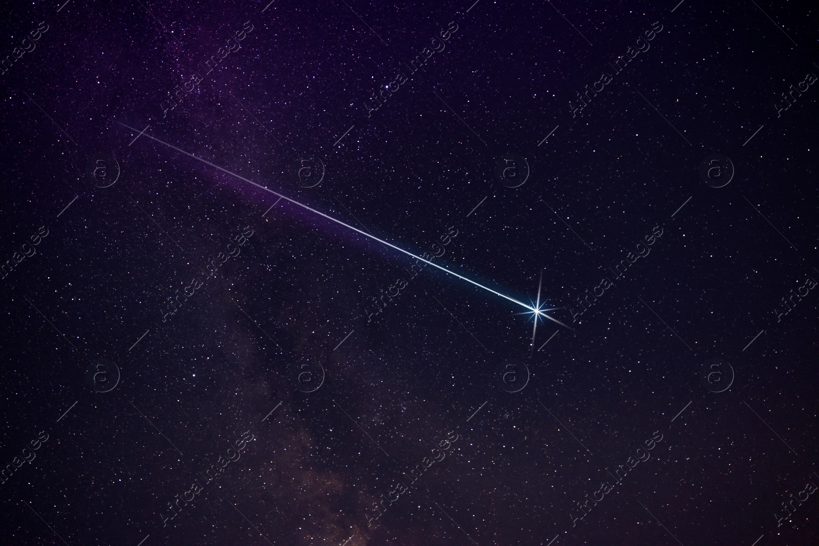 Image of Picturesque view of shooting star in night sky
