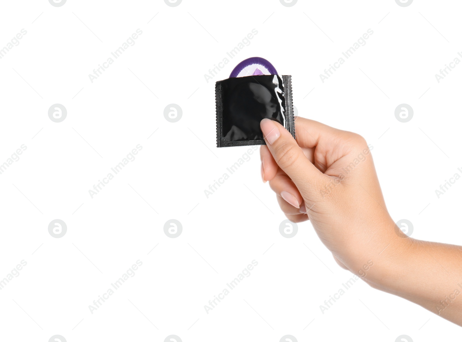 Photo of Woman holding condom on white background, closeup