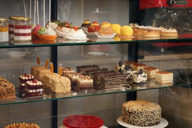 Showcase with different tasty desserts in store