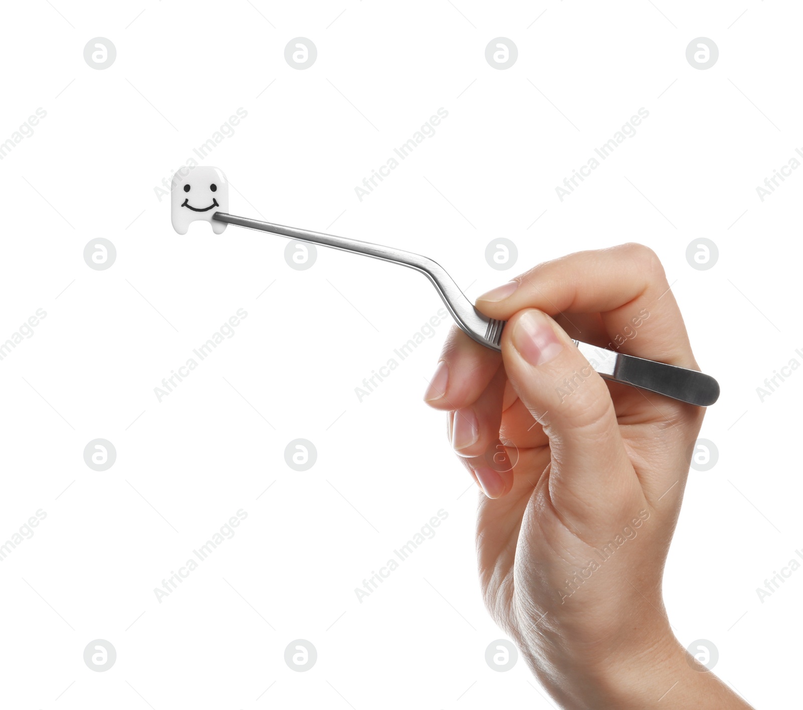 Photo of Woman holding small plastic tooth with tweezers on color background