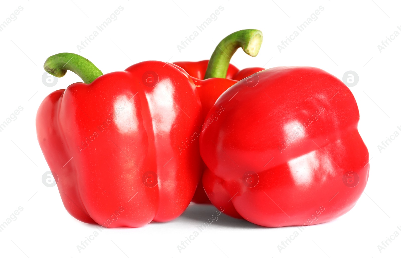 Photo of Tasty ripe red bell peppers on white background