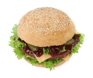 Delicious cheeseburger with lettuce, pickle, ketchup and patty isolated on white