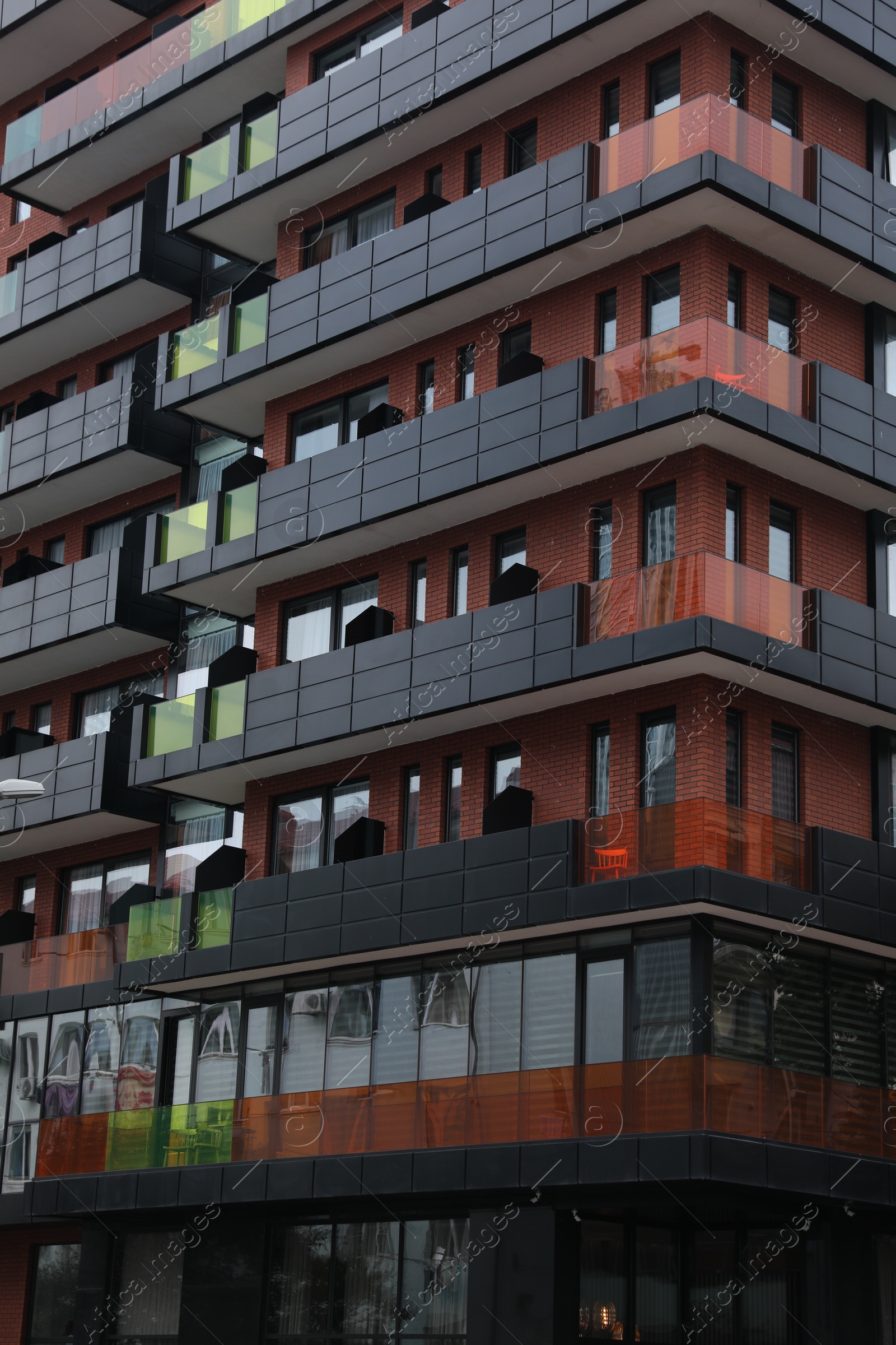 Photo of Exterior of residential building with balconies outdoors