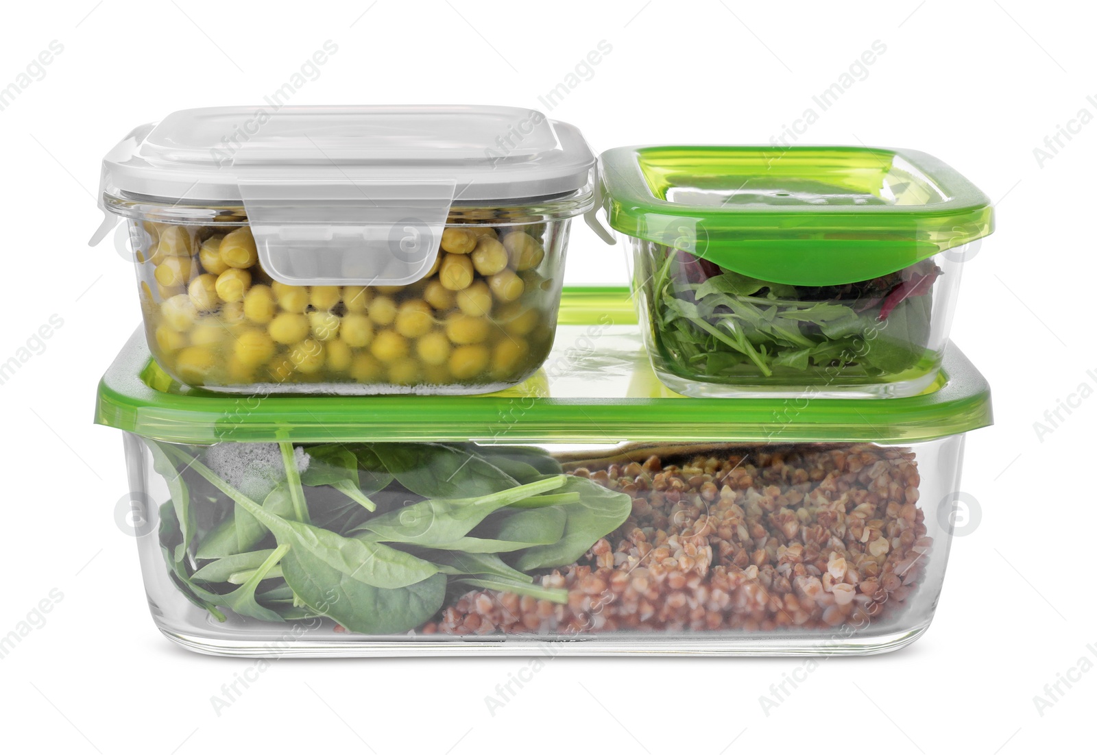 Photo of Glass containers with different fresh products isolated on white