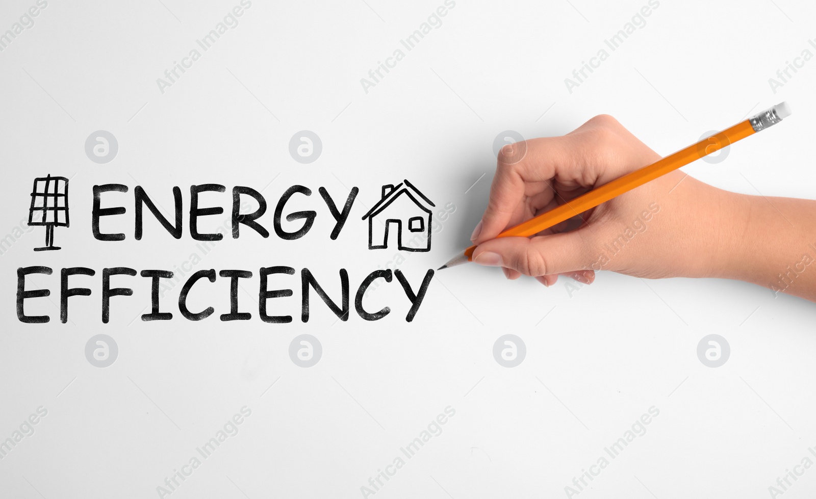 Image of Energy efficiency concept. Woman writing on white background, closeup