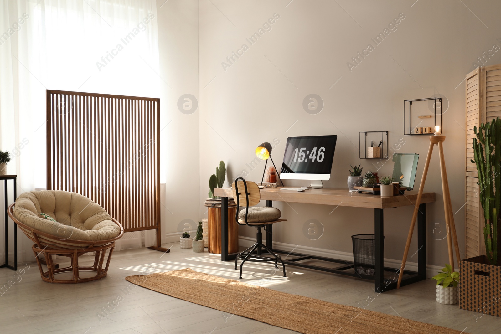 Photo of Room interior with comfortable workplace. Modern computer on wooden desk