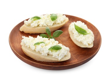 Photo of Bread with cottage cheese and basil isolated on white