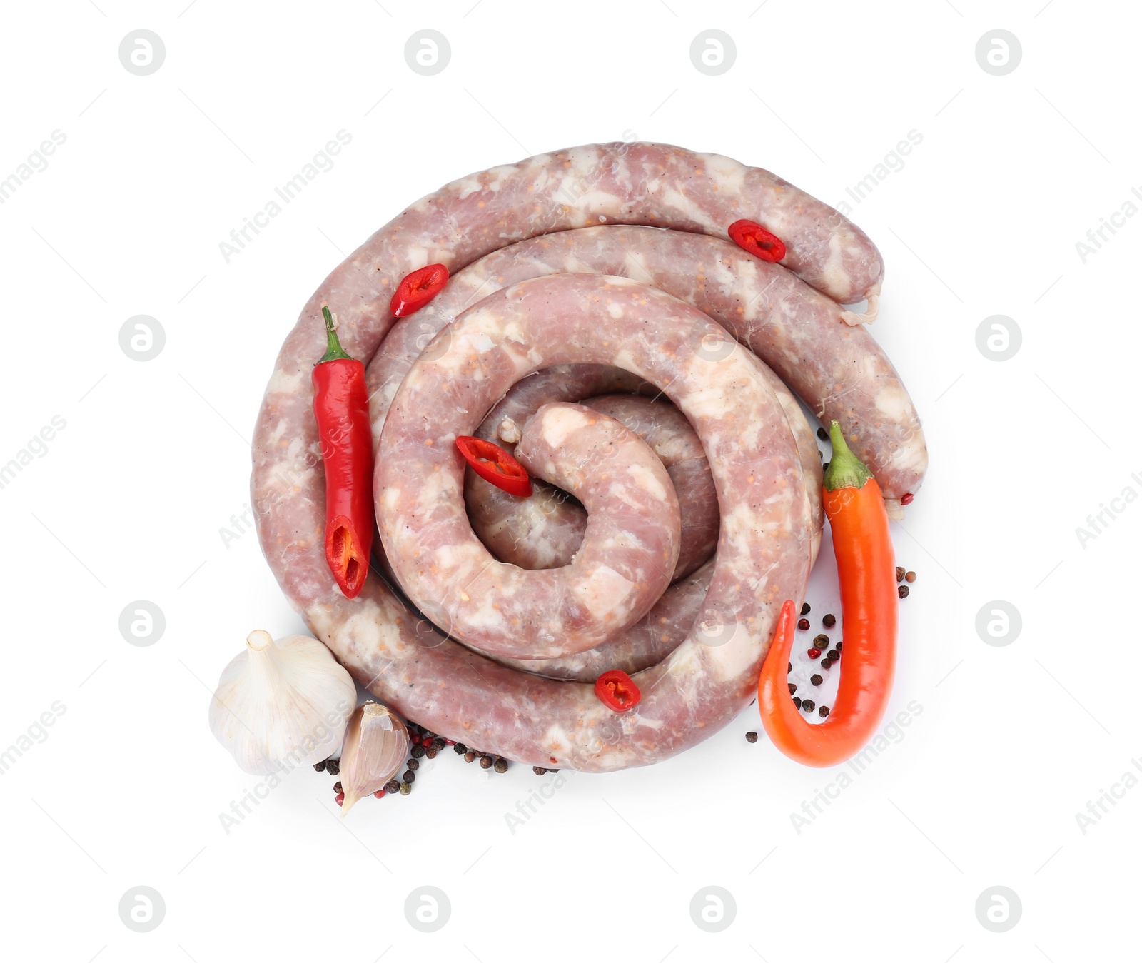 Photo of Homemade sausages, garlic, chili and peppercorns isolated on white, top view