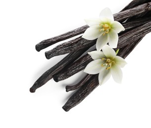 Photo of Vanilla pods and flowers isolated on white, top view