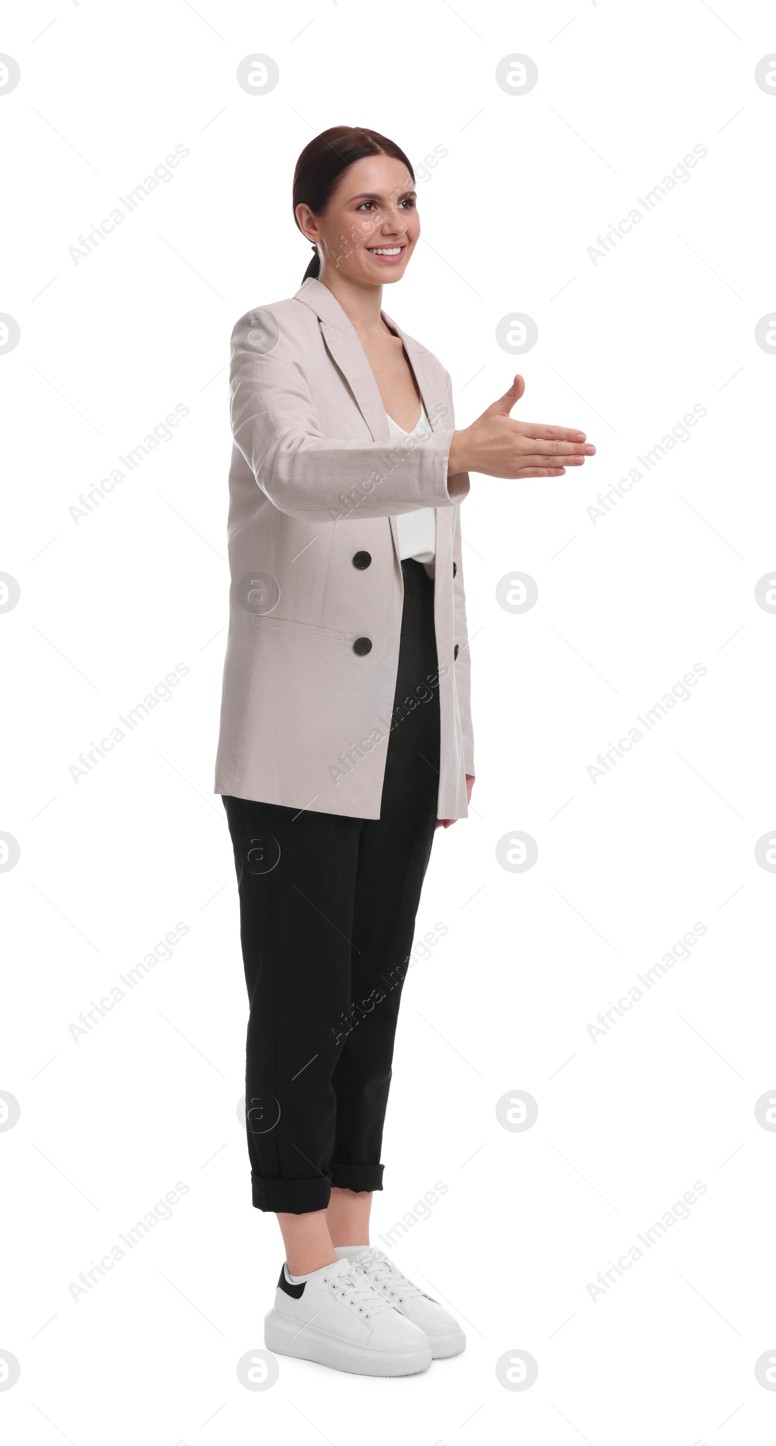 Photo of Beautiful young businesswoman in suit on white background