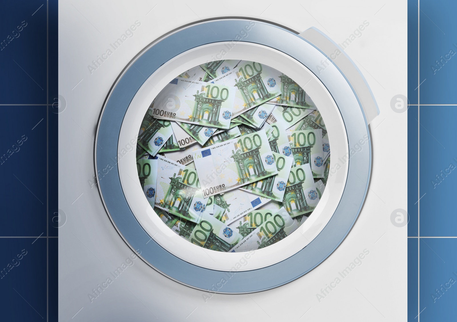 Image of Money laundering. Many euro banknotes in washing machine