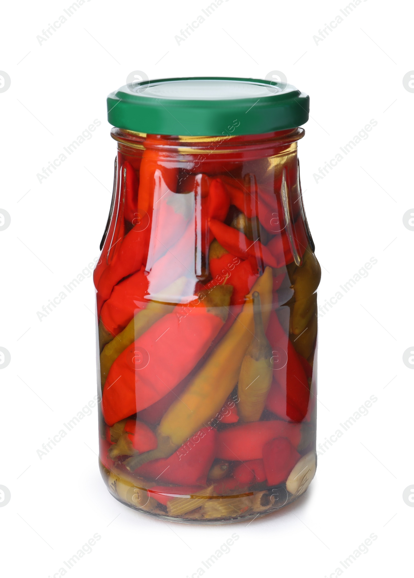 Photo of Glass jar with pickled chili peppers isolated on white