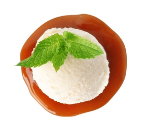 Photo of Scoop of delicious ice cream with mint and caramel sauce on white background, top view