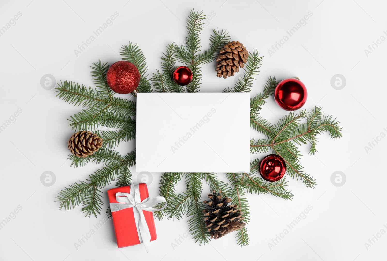 Photo of Beautiful Christmas decor and blank card on white background, flat lay