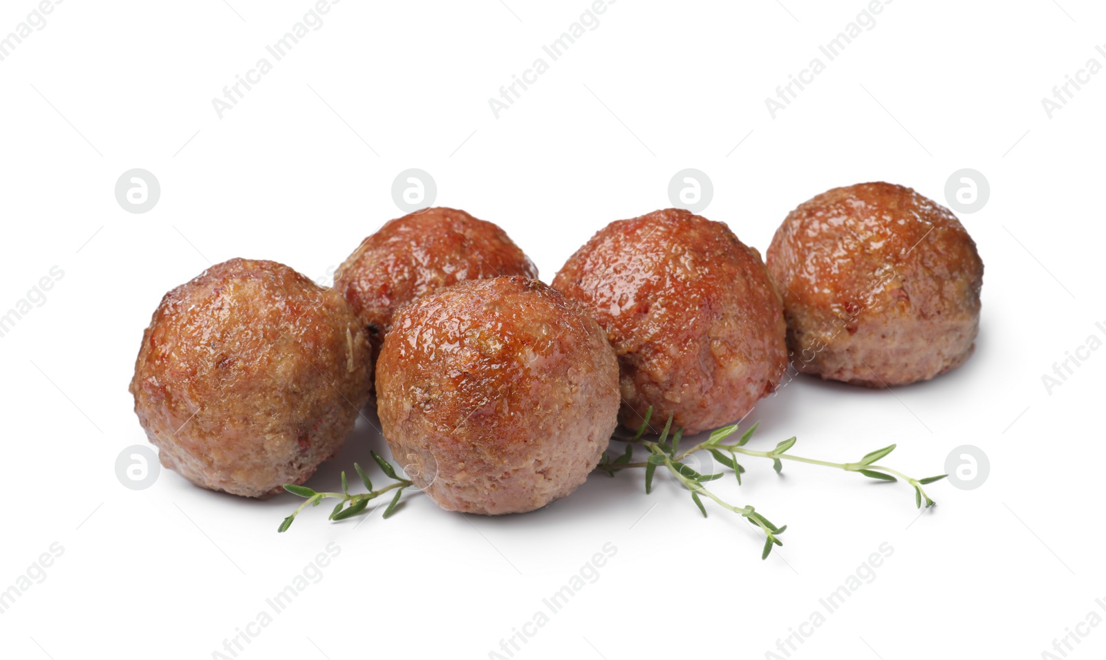 Photo of Many tasty cooked meatballs on white background