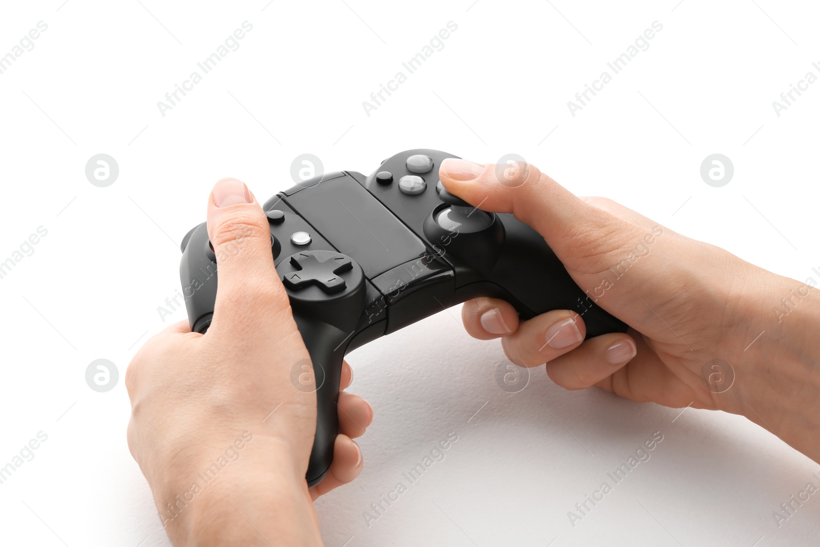 Photo of Young woman holding video game controller on white background, closeup