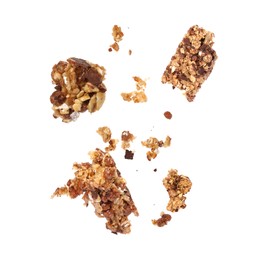 Image of Granola bar breaking in air on white background