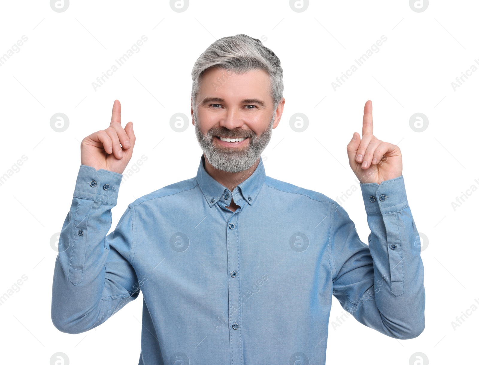 Photo of Mature businessman in stylish clothes posing on white background