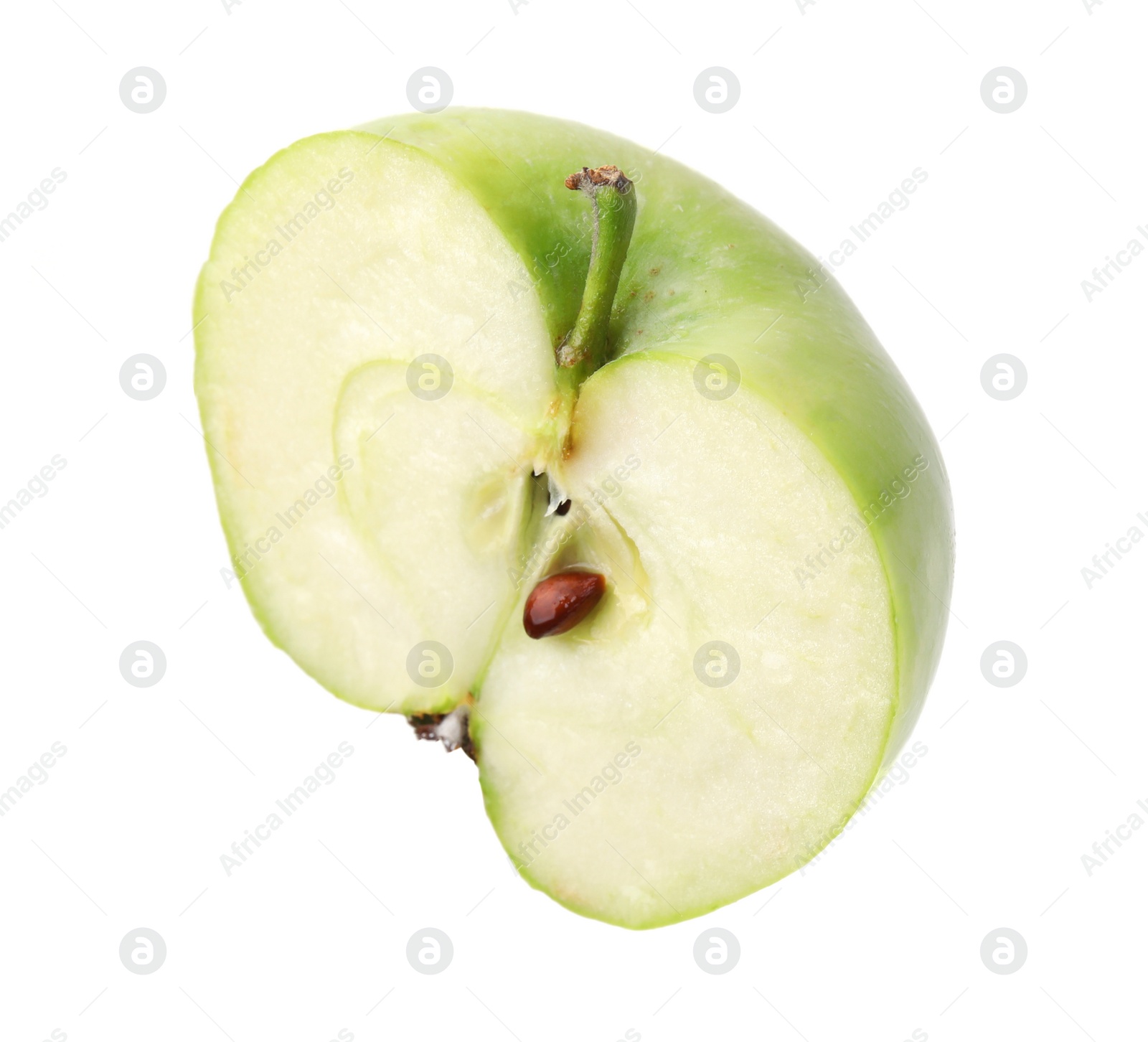 Photo of Half of ripe green apple on white background