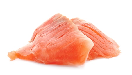 Fresh sliced salmon fillet on white background